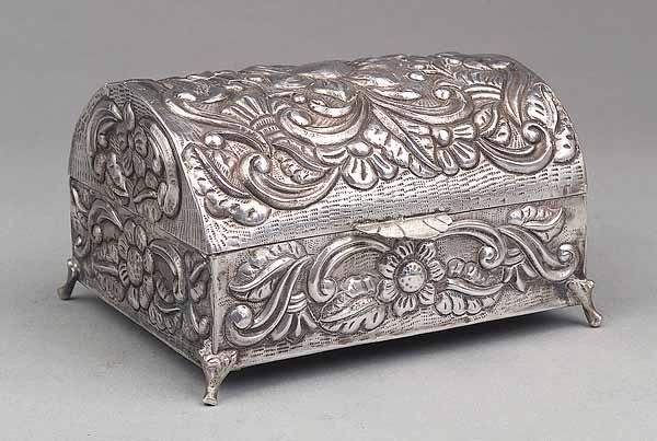 Appraisal: A South American Silver Repouss Casket marked on the bottom