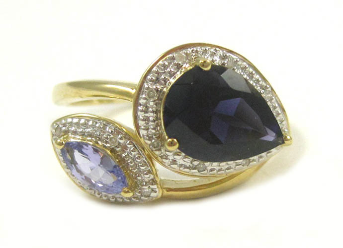 Appraisal: AMETHYST TANZANITE AND DIAMOND RING k yellow and white gold