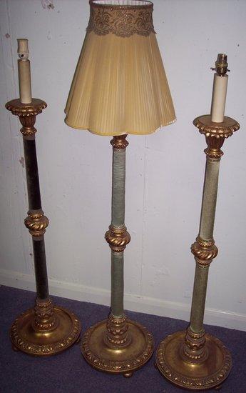 Appraisal: Three matching standard lamps of Italian design each with gilded