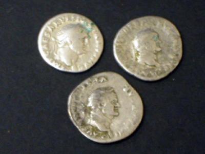 Appraisal: THREE VESPASIAN DENARII with heifer Pax and Mars on reverse