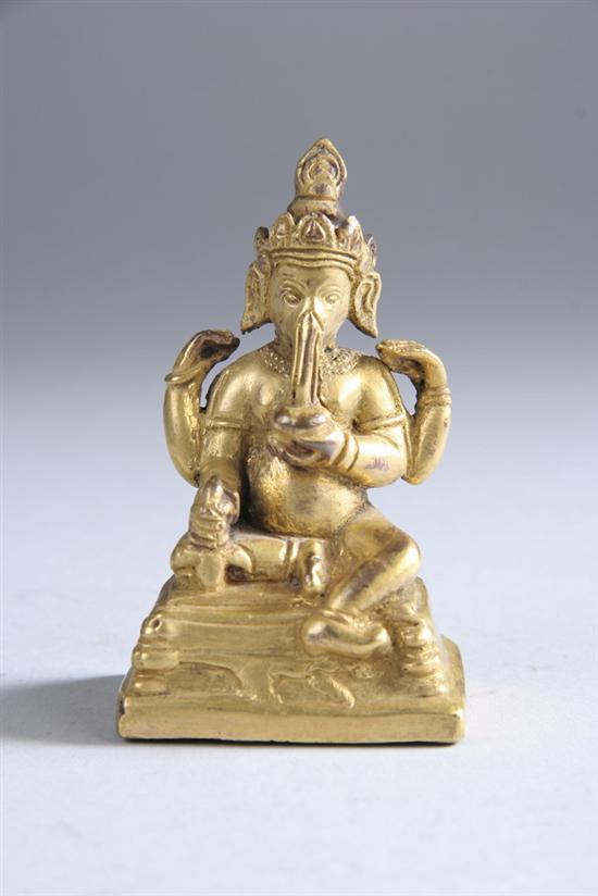 Appraisal: TIBETAN GILT BRONZE FIGURE OF GANESHA th century Seated on