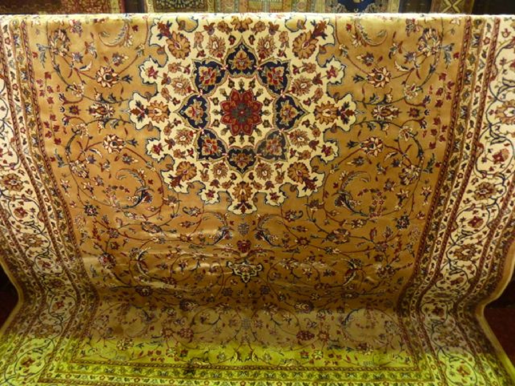 Appraisal: A contemporary Persian rug with pale gold field central white