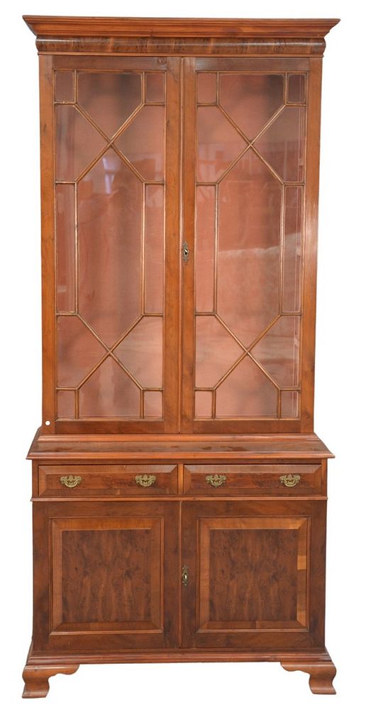 Appraisal: Two-Part Cabinet with glass shelves burlwood on ogee feet height