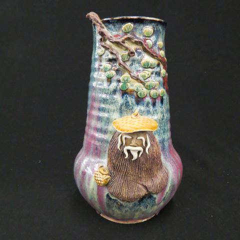 Appraisal: Oriental Pottery Vase raised figure foliage Sumida Gawa style beautiful