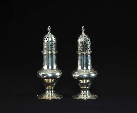 Appraisal: PAIR OF ENGLISH STERLING PEPPER SHAKERS London Baluster form with