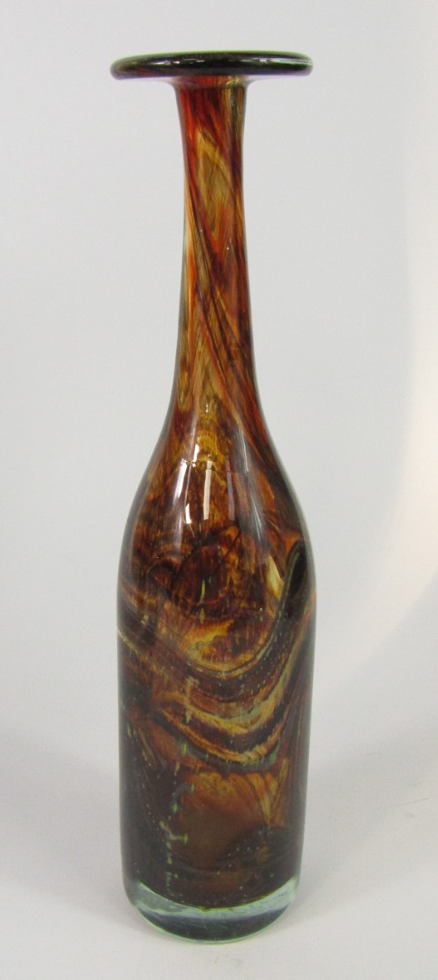 Appraisal: A Michael Harris Mdina glass bottle of attenuated form swirling