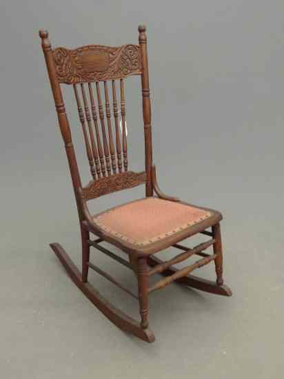 Appraisal: Victorian pressed back oak rocking chair '' Seat Ht ''