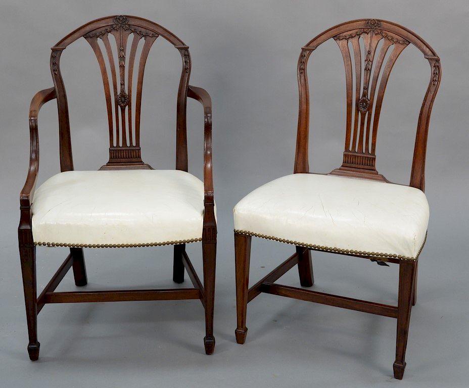 Appraisal: Set of twelve mahogany George III dining chairs with leather