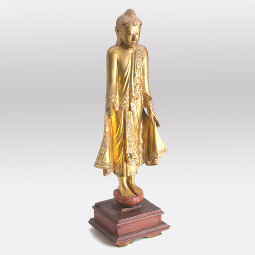 Appraisal: BURMESE Gilt wooden figure of a standing Buddha with applied