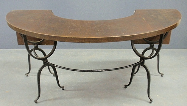 Appraisal: - Wrought iron and oak conservatory table in the style