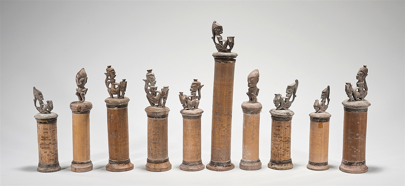 Appraisal: each with figural finial bodies incised with designs x largest