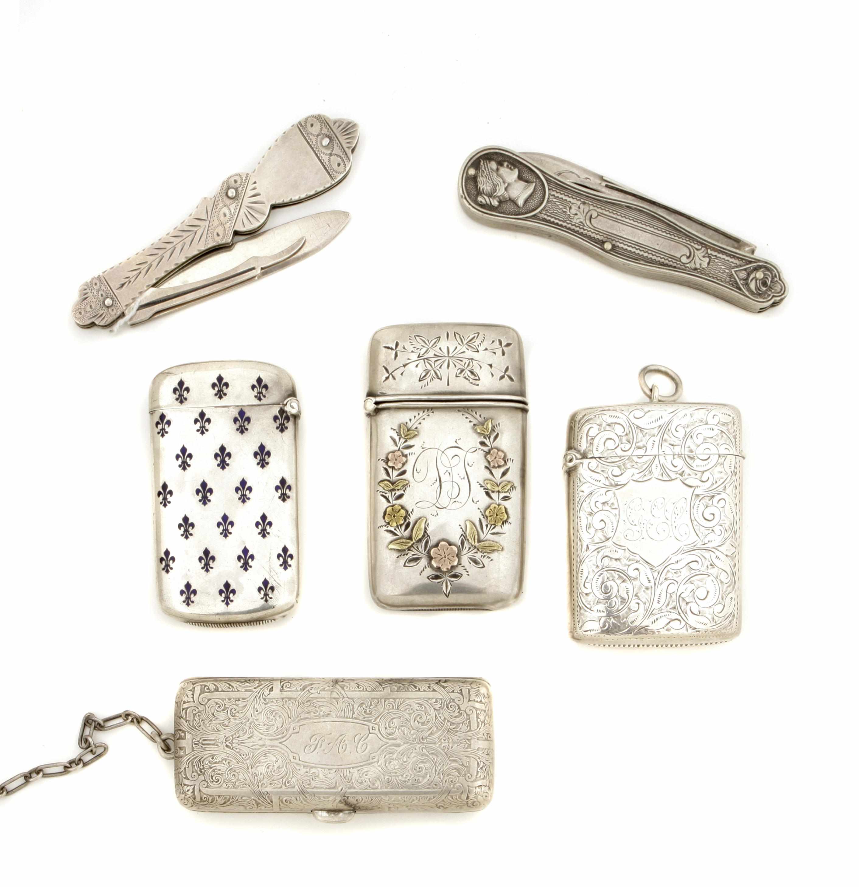 Appraisal: A group of collectible silver and metal pocket items th