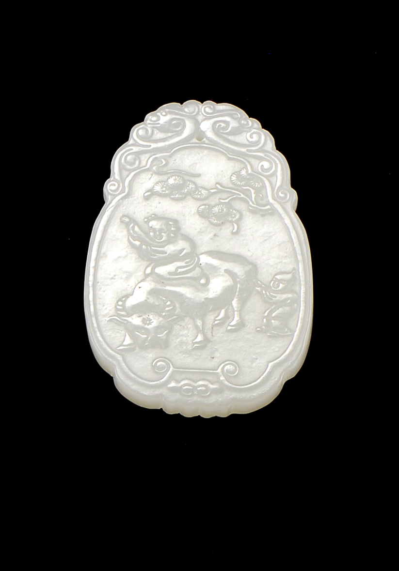 Appraisal: WHITE JADE PENDANT In pear shape Carved on one face