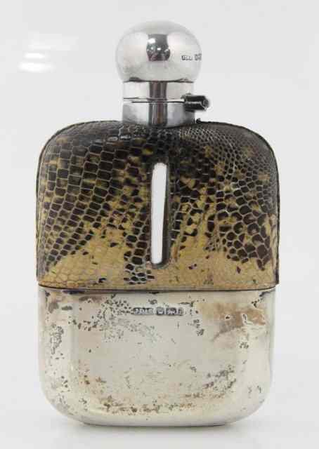 Appraisal: A silver and leather hip flask James Dixon Sons Sheffield