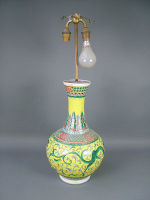 Appraisal: A Chinese famille -jeaune ceramic table lamp of bottle form