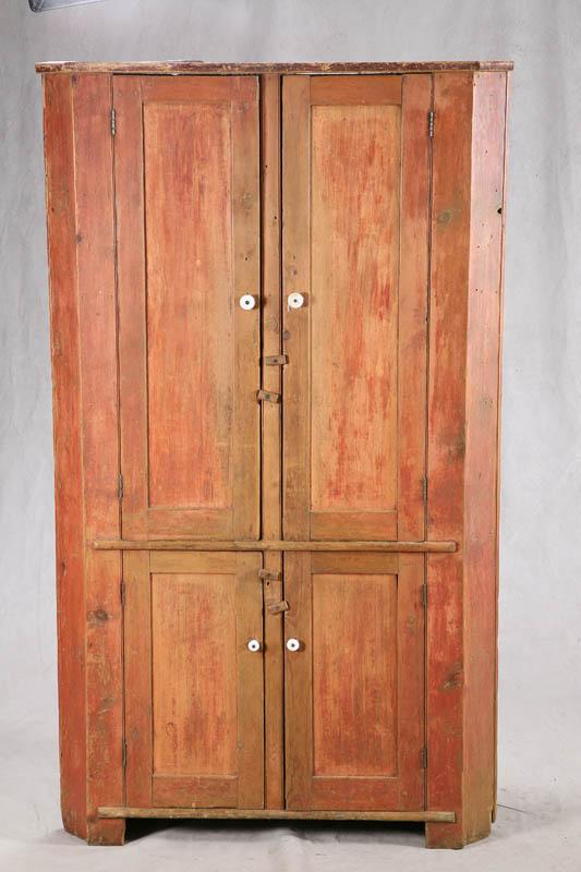 Appraisal: CORNER CUPBOARD Pine blind door cupboard with porcelein pulls and