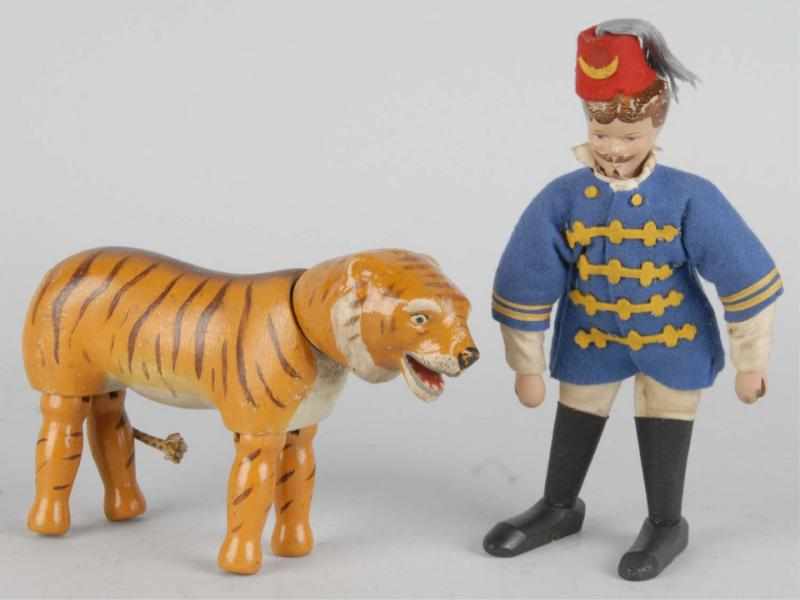 Appraisal: Schoenhut Lion Tamer Painted-Eye Tiger Description All original Condition Excellent