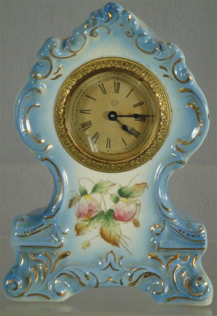 Appraisal: Light blue floral decorated Ansonia china clock hr movement wound