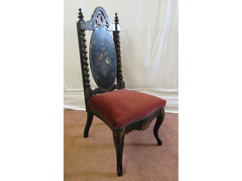 Appraisal: A Victorian papier mache chair the arched back flanked by