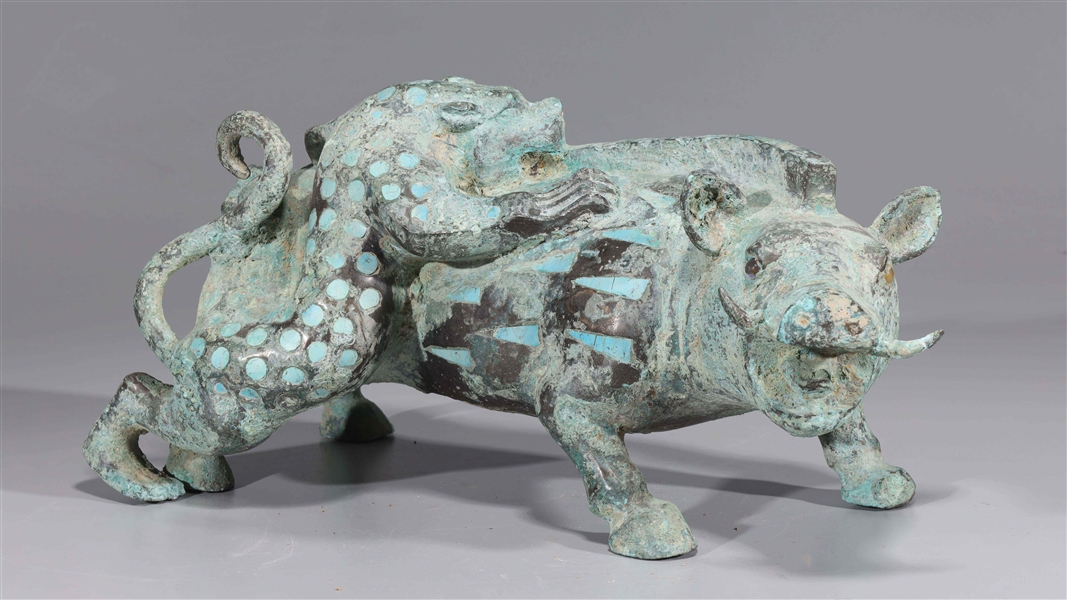 Appraisal: Chinese enameled bronze statue of a boar and a cheetah