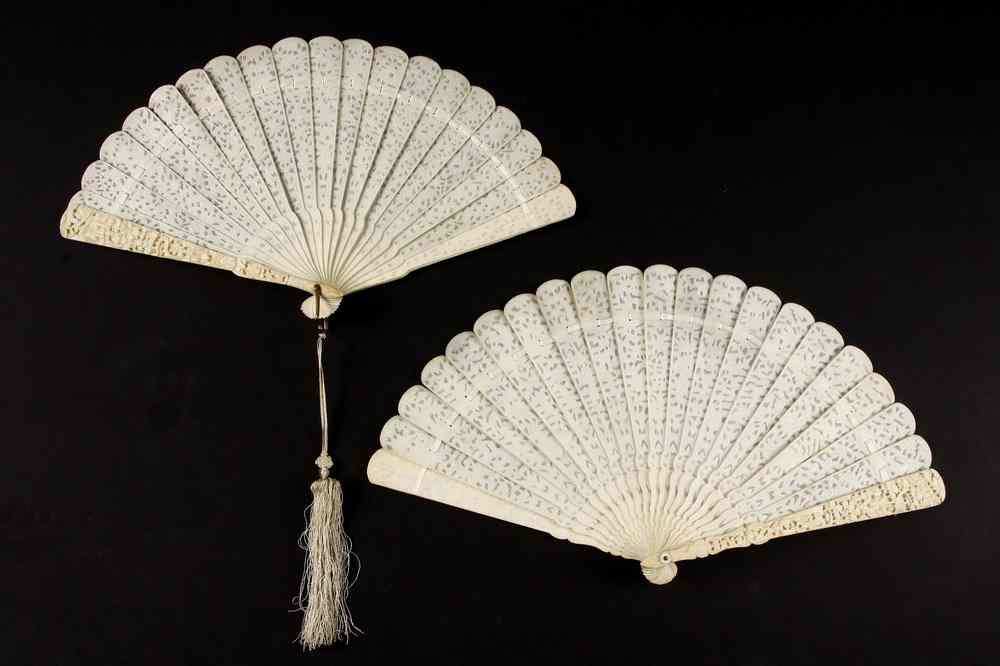 Appraisal: CHINESE CARVED IVORY HAND FANS - Two th c Chinese