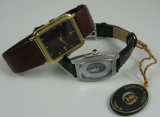 Appraisal: TWO MEN'S DRESS WATCHES Raymold Weil model with Swiss -jewel