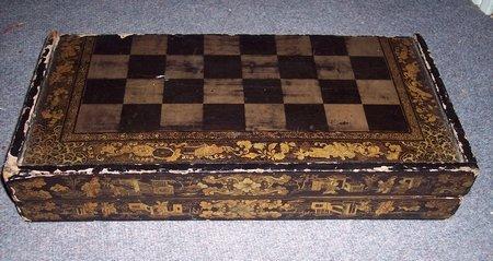 Appraisal: An early th Century Chinese export lacquered games board together