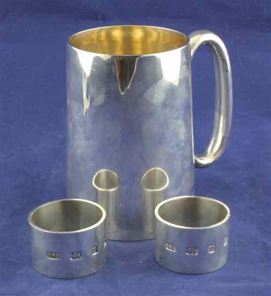 Appraisal: An Edwardian plain silver pint mug of restrained tapering form