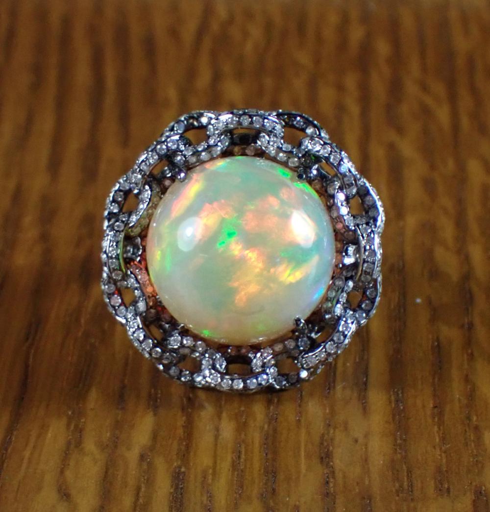 Appraisal: OPAL DIAMOND AND EIGHTEEN KARAT WHITE GOLD RING with appraisal