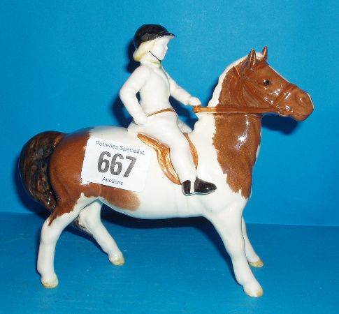 Appraisal: Girl On Skewbald Pony Girl In All Over White Gloss