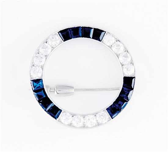 Appraisal: Diamond and sapphire brooch alternating bands of European cut diamonds