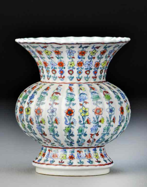 Appraisal: Chinese Doucai Painted Porcelain VaseThe scalloped vase of spittoon shape