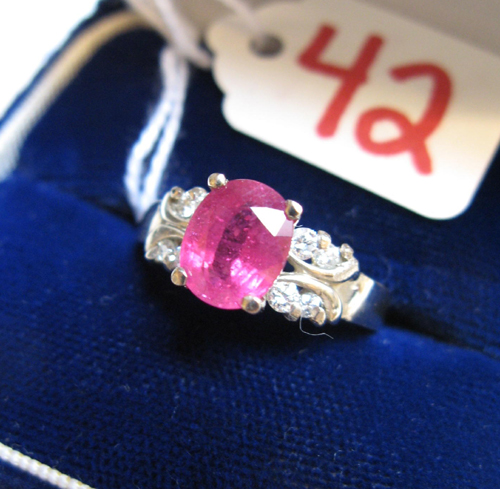 Appraisal: RUBY DIAMOND AND FOURTEEN KARAT WHITE GOLD RING Four round-cut