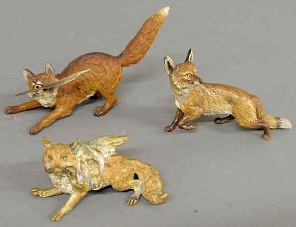 Appraisal: Three Austrian cold painted bronze foxes tallest h