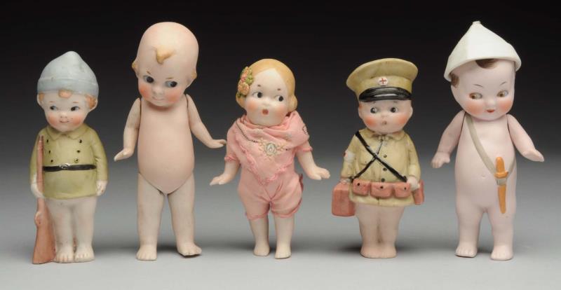 Appraisal: Lot Of All-Bisque Figures Cupid with side-glancing eyes jointed shoulders