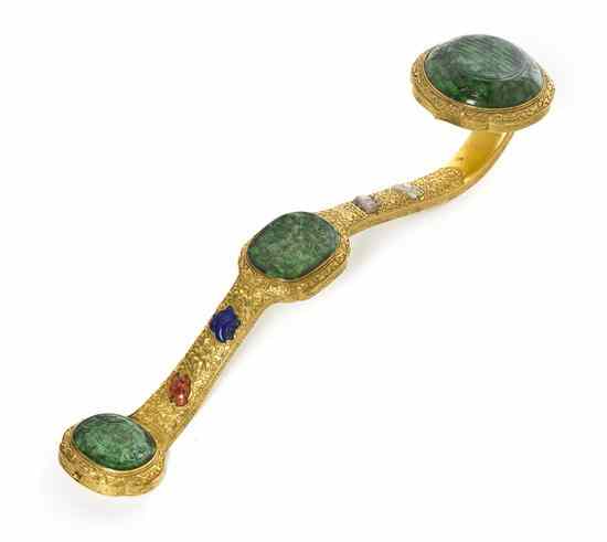 Appraisal: A Gilt Bronze Stone Inset Ruyi Scepter having three carved