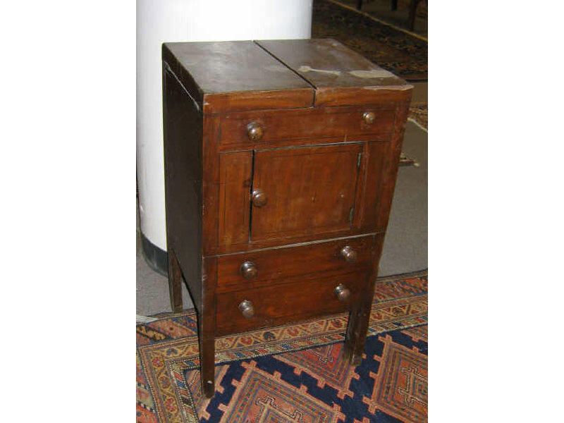 Appraisal: ENGLISH TH CENTURY MAHOGANY COMMODE Hinged top opens to a