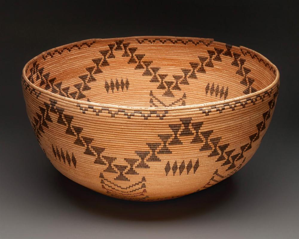 Appraisal: A large polychrome Washoe mush bowl basket First-quarter th Century