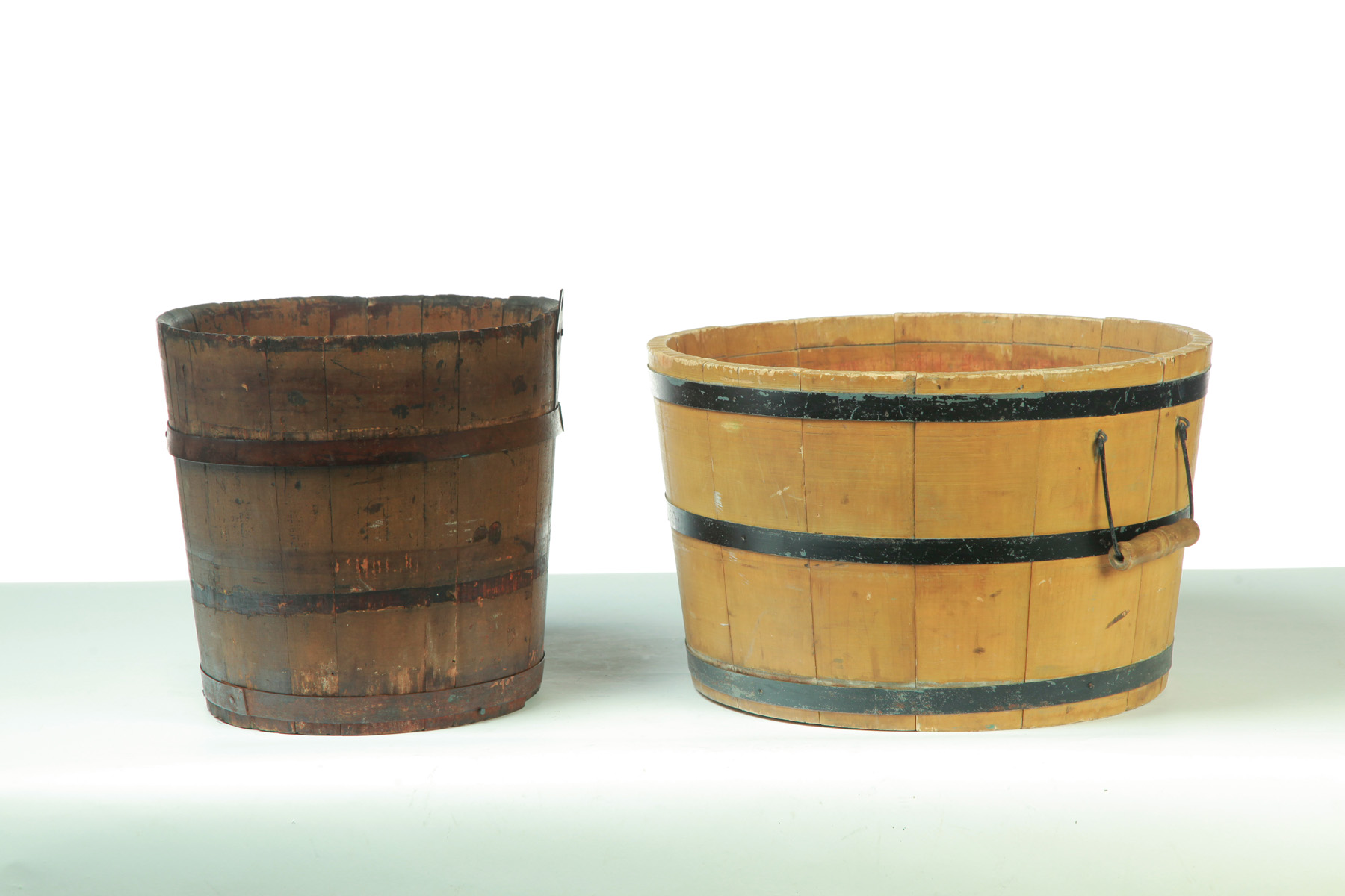 Appraisal: TWO STAVE CONSTRUCTED BUCKETS American ca pine Larger with double