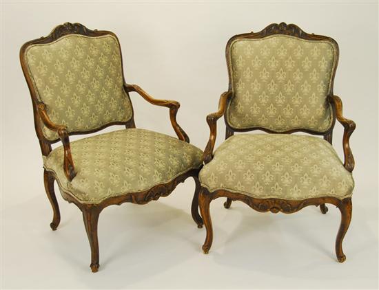 Appraisal: PAIR OF LOUIS XV CARVED FRUITWOOD FAUTEUIL A LA REINE