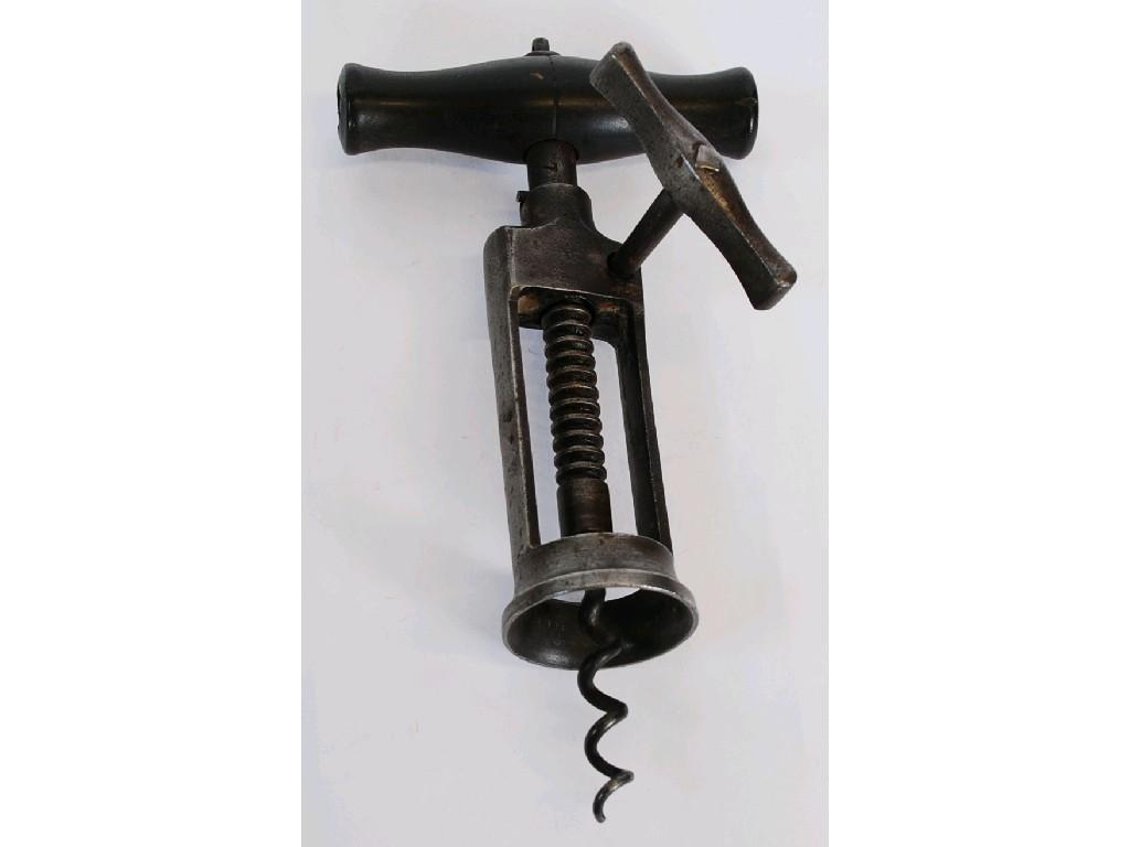 Appraisal: VICTORIAN STEEL CORKSCREW 'LONDON RACK' TYPE the ebonised turned wood