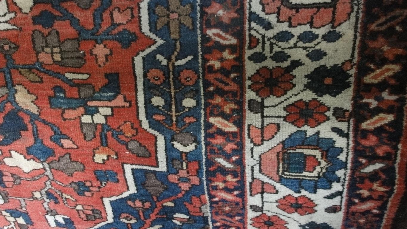 Appraisal: A Middle Eastern design carpet with a central floral medallion