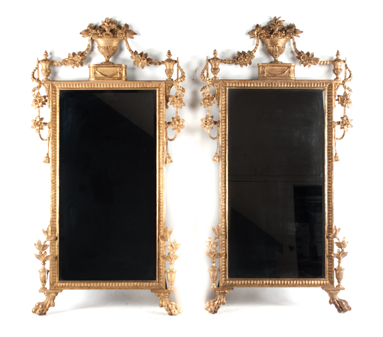 Appraisal: Pair of Regency style giltwood mirrors each mirror with floral