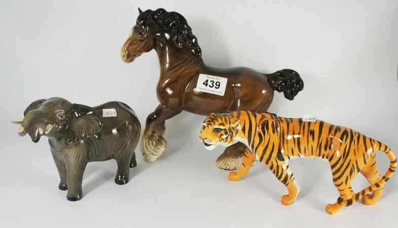 Appraisal: Beswick Tigress legs restuck Elephant tusk and trunk restuck and