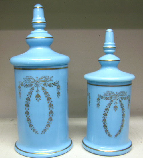 Appraisal: TWO FRENCH BLUE OPALINE GLASS VANITY JARS Each lidded cylindrical