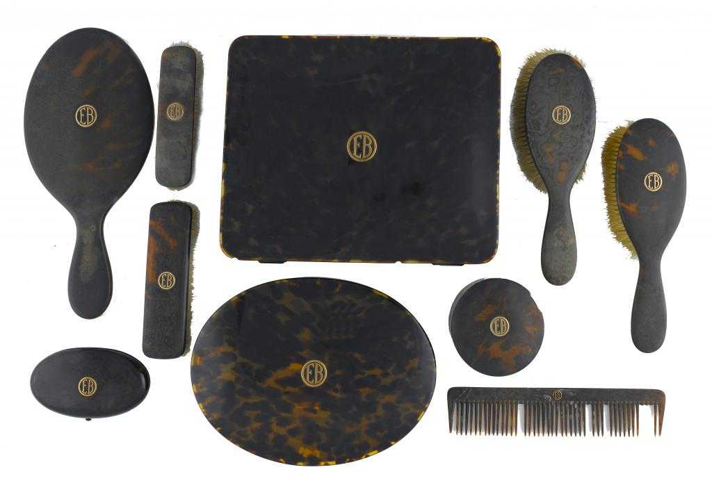 Appraisal: AN EDWARD VII TORTOISESHELL DRESSING SET applied with gold initials