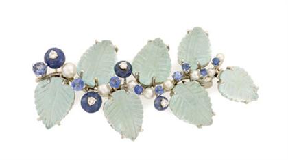 Appraisal: karat white gold aquamarine and sapphire foliate spray brooch Seaman