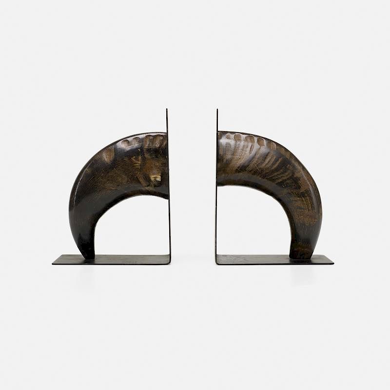 Appraisal: Carl Aubock III bookends model pair Carl Aubock III bookends