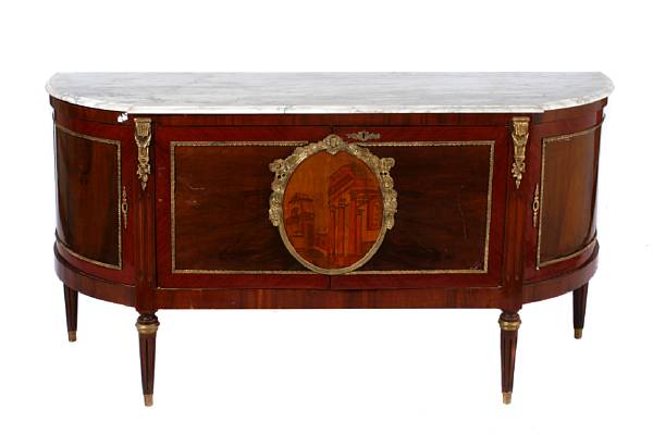 Appraisal: A Louis XVI style gilt bronze mounted and marble topped