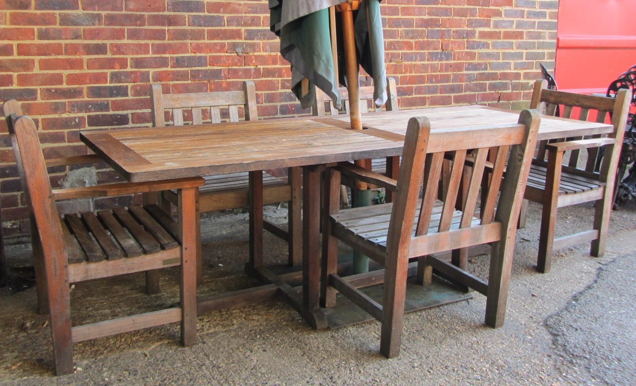 Appraisal: A th century slatted teak rectangular garden table x cm